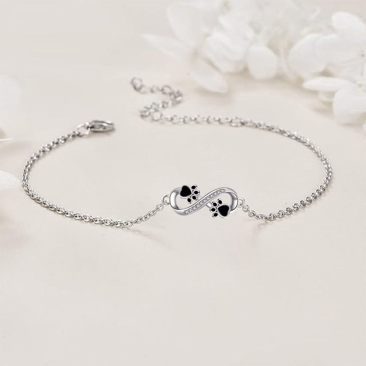 Pulseira com símbolo do infinito, pendente de pata e zircónia