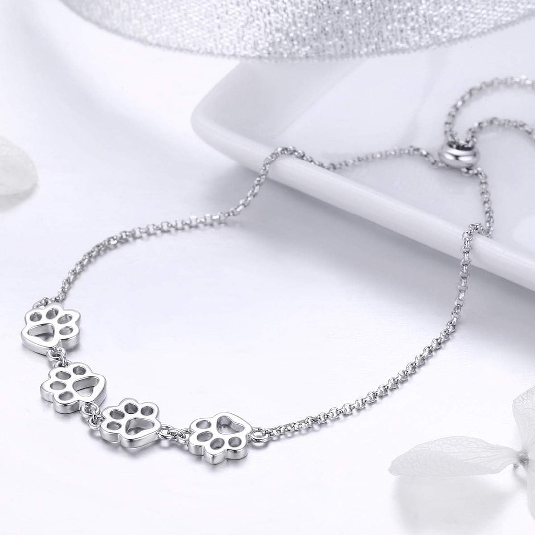 Pulseira ajustável em prata esterlina com impressão de pata de cão