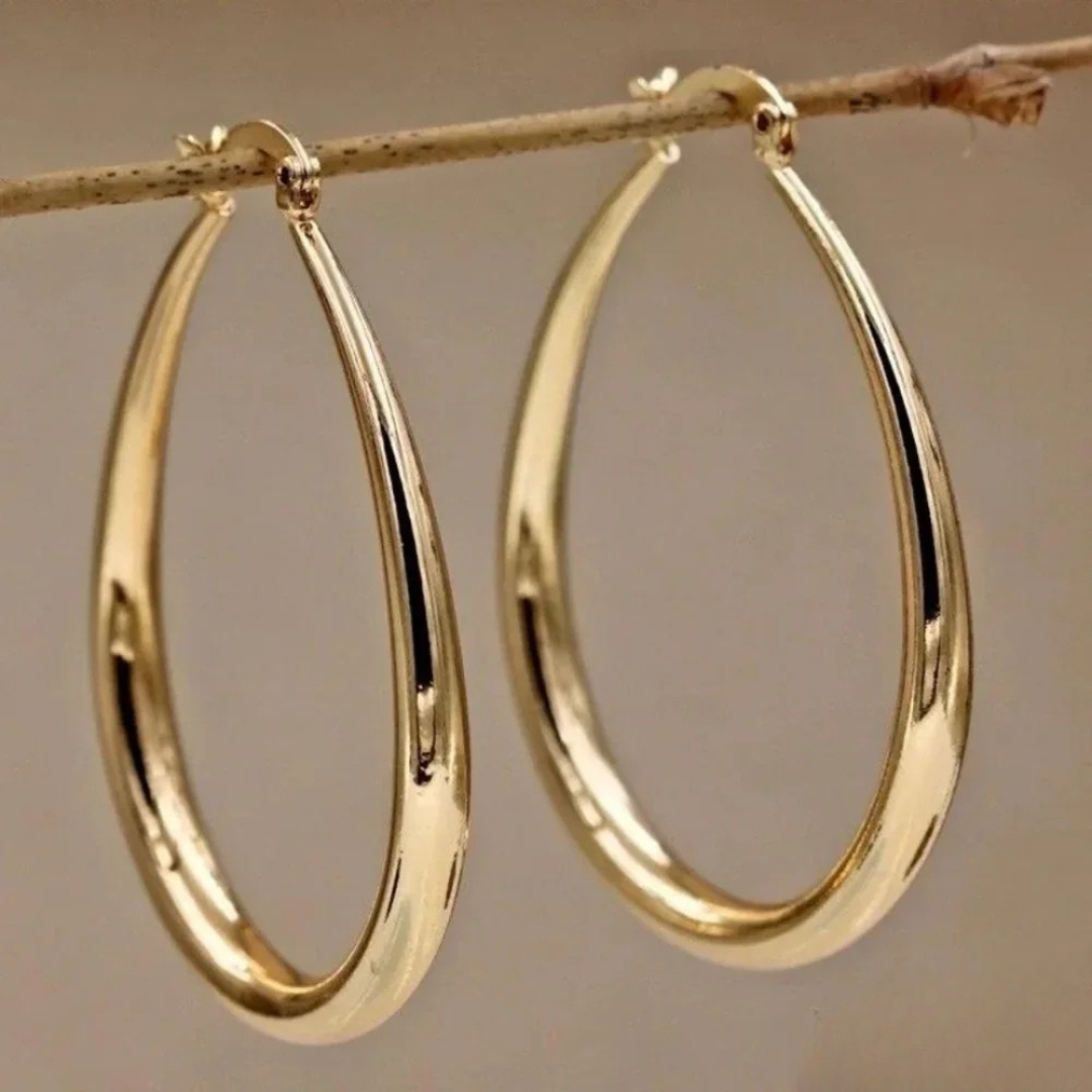 Brincos elegantes em ouro