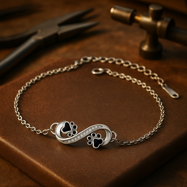 Pulseira com símbolo do infinito, pendente de pata e zircónia