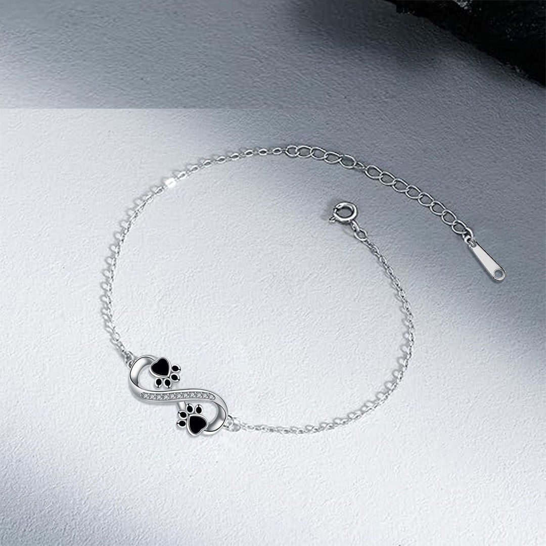 Pulseira com símbolo do infinito, pendente de pata e zircónia